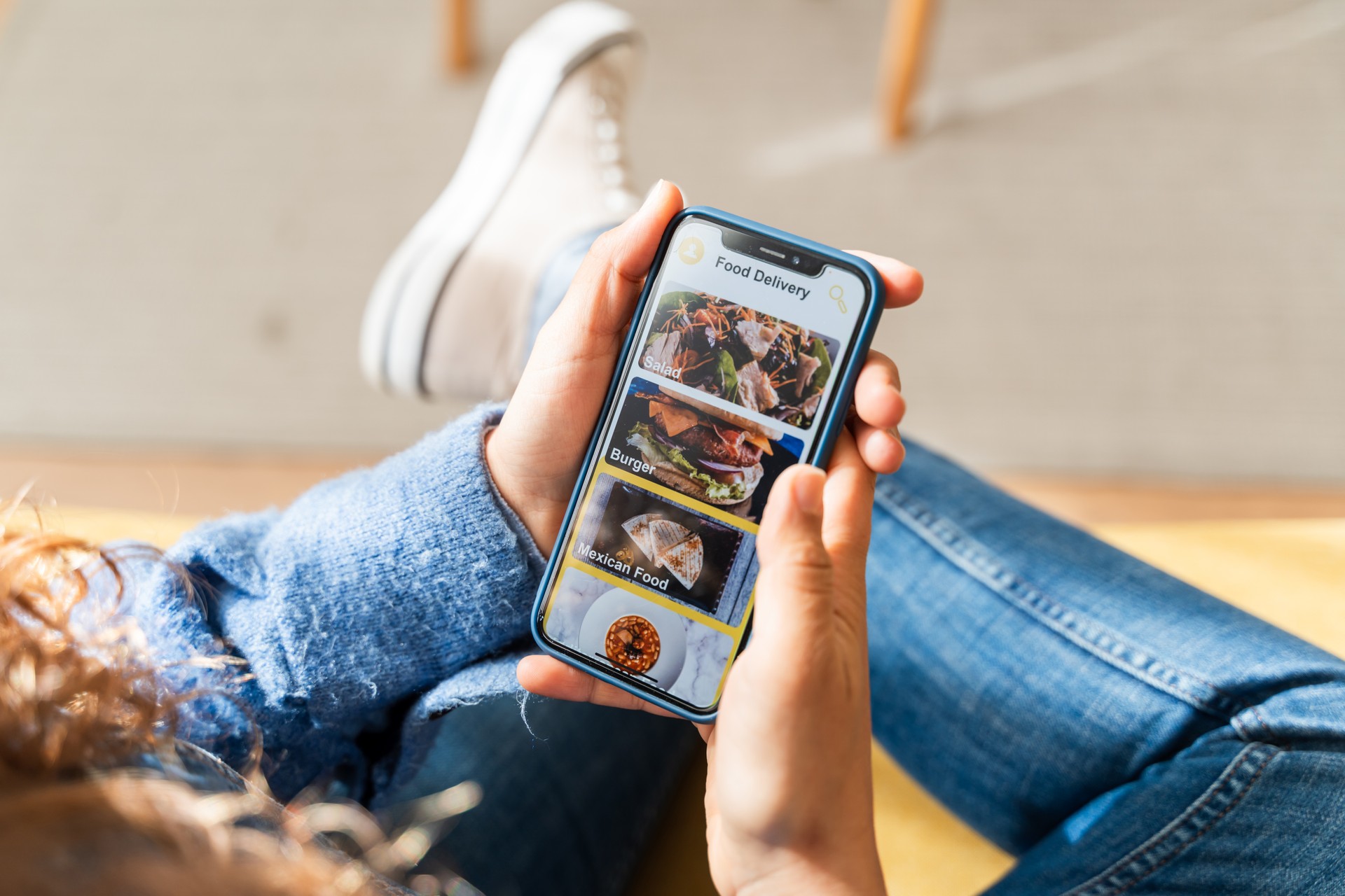 Casual smartphone user ordering food online